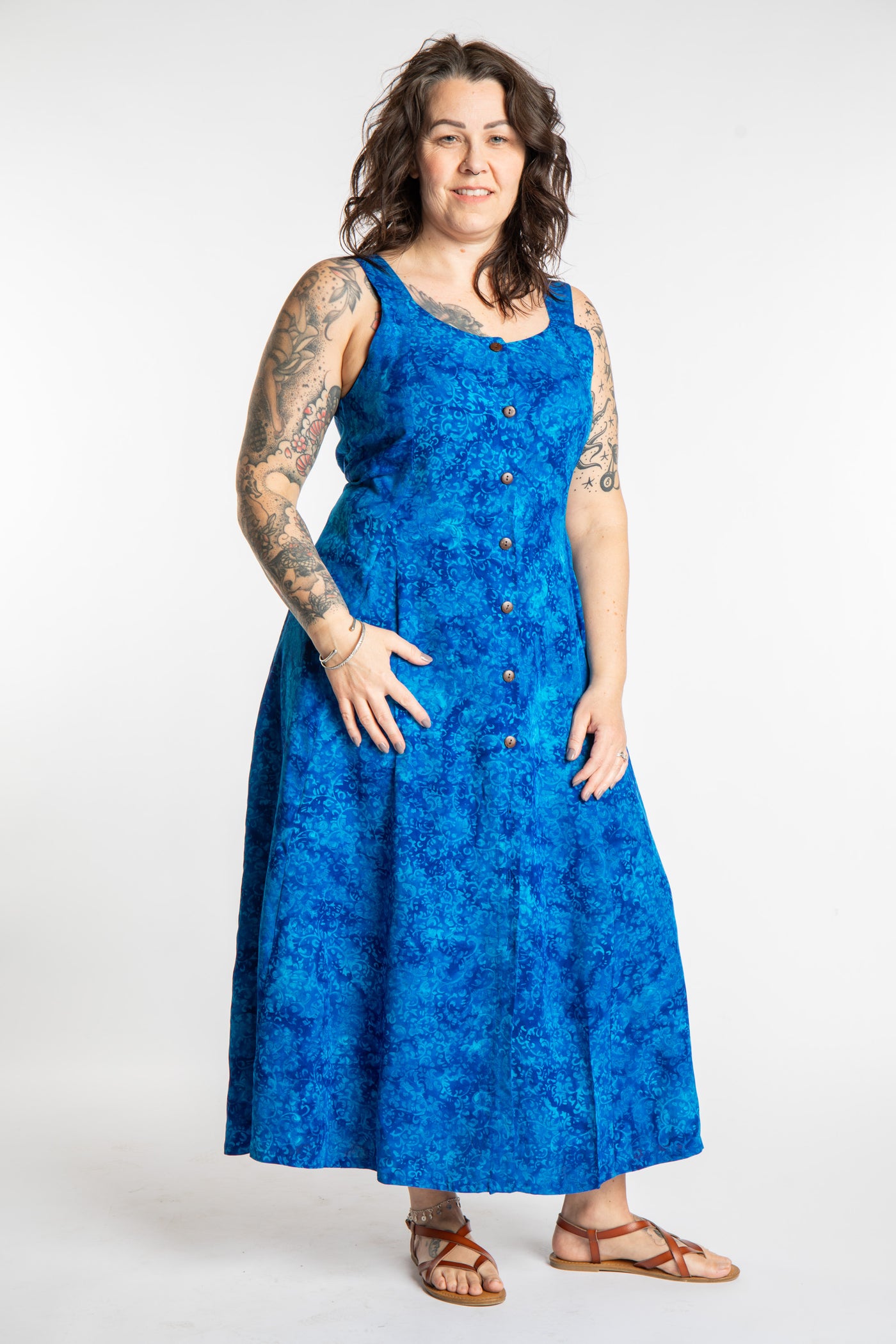 Morgan is wearing the Cobalt Blue Ani Button Batik Maxi Dress in size M