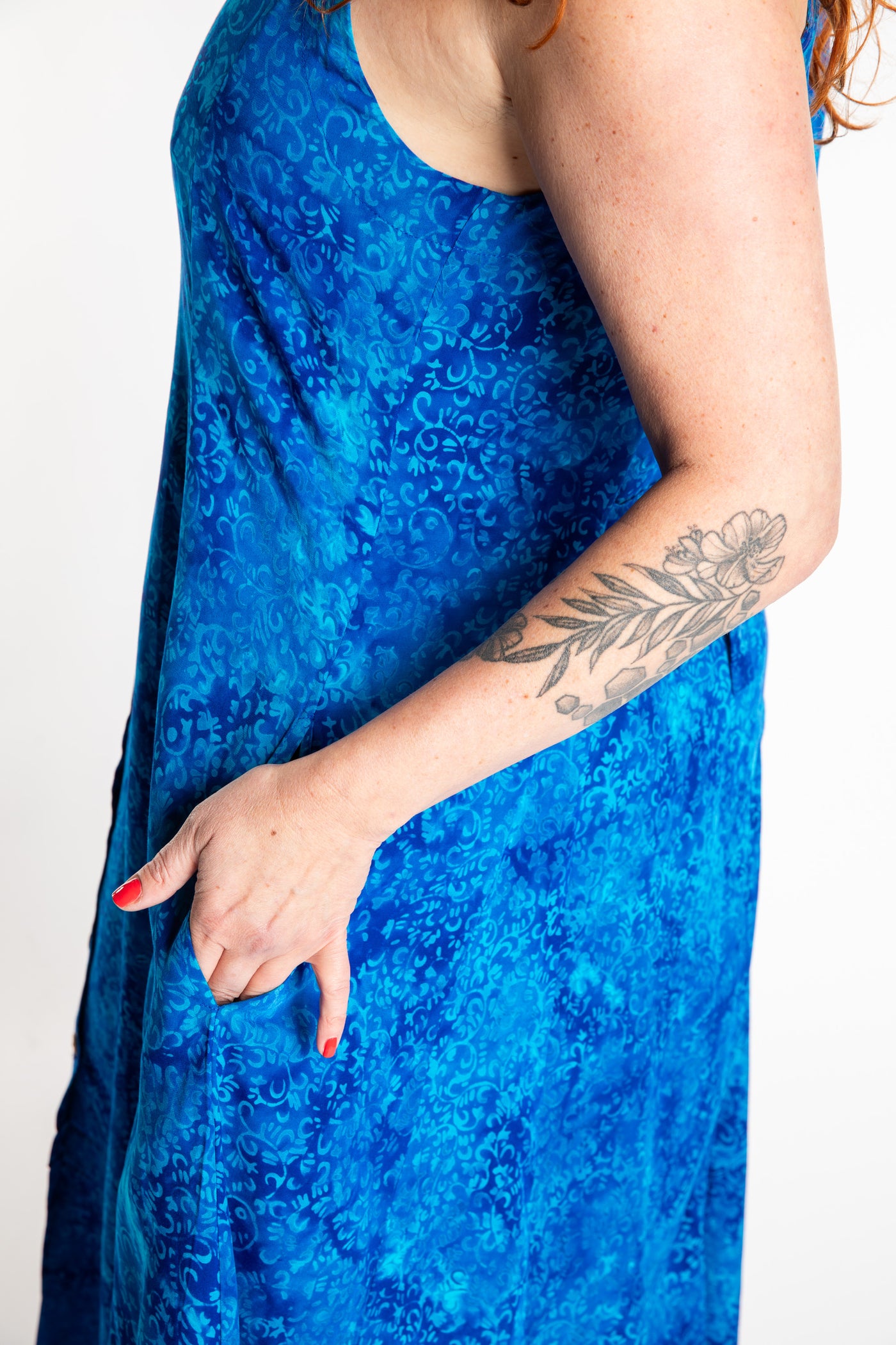 Maggie is wearing the Large Blue Cobalt Ani Button Batik Maxi Dress