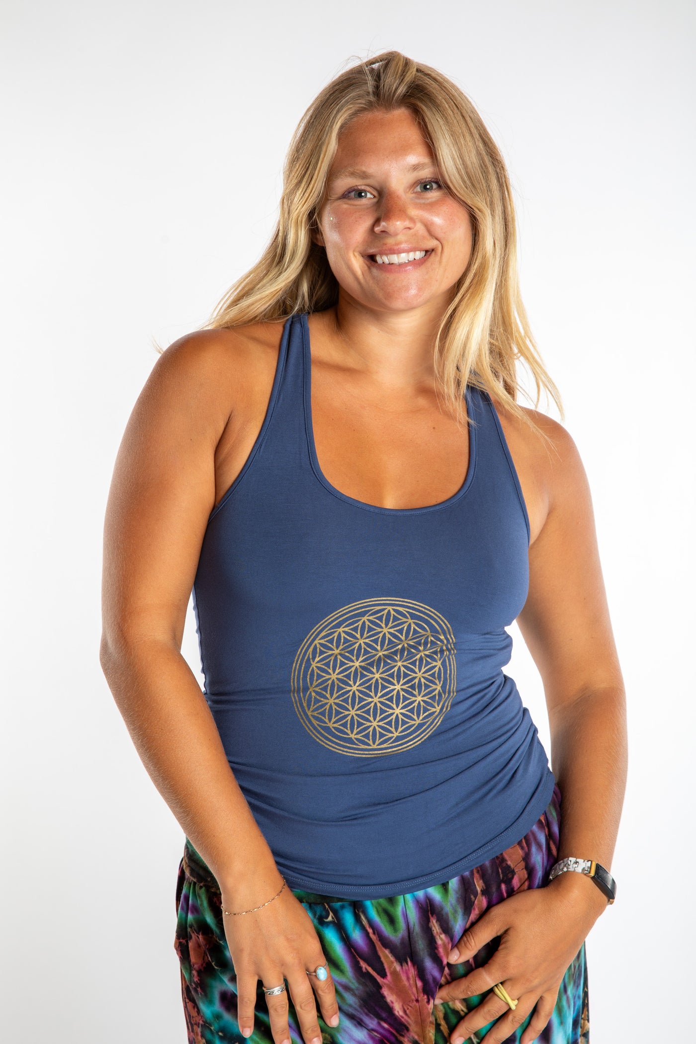 Sophie wearing a Small blue Flower of Life tank top in Indigo
