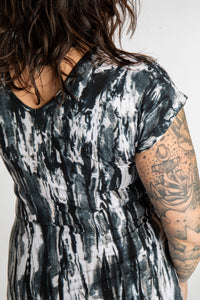 Morgan is wearing the black Tara Tie Dye Maxi Dress in size M