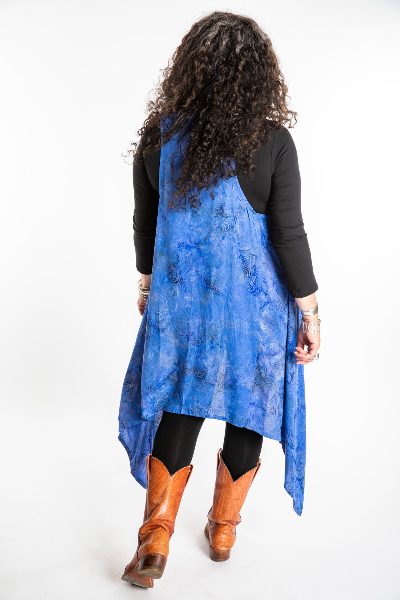 Susan wearing a long batik patterned vest in Deep Blue