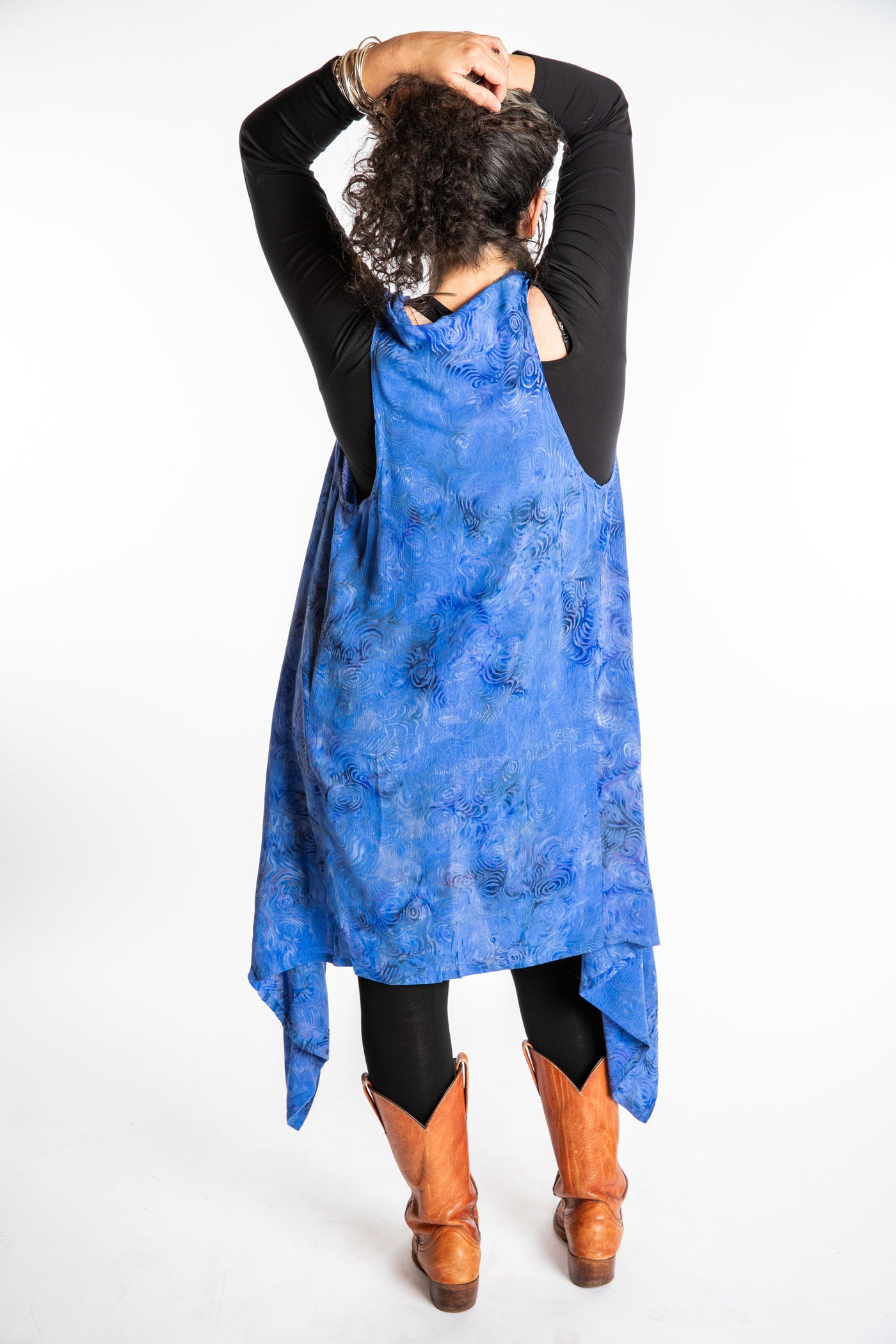 Susan wearing a long batik patterned vest in Deep Blue