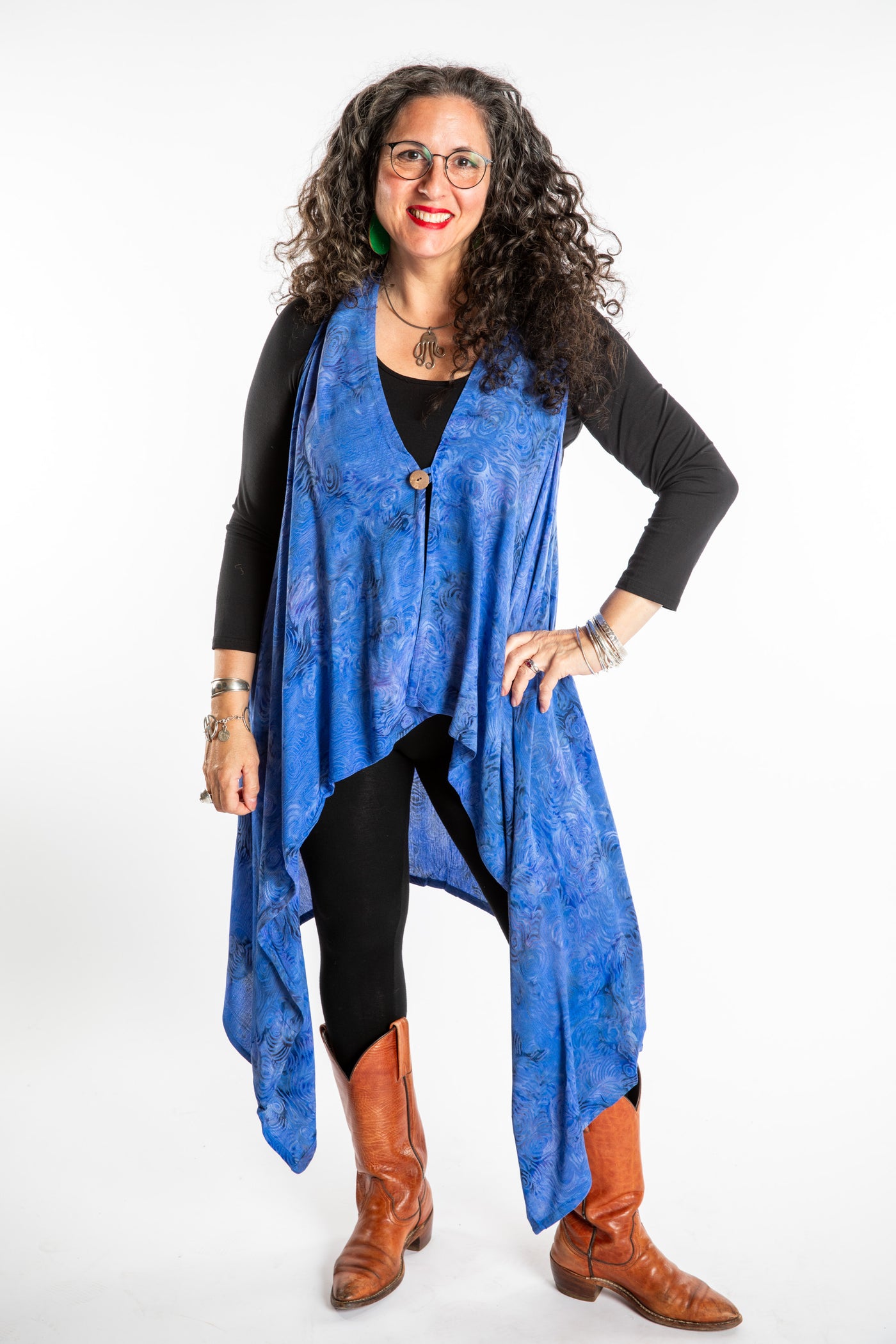 Susan wearing a long batik patterned vest in Deep Blue
