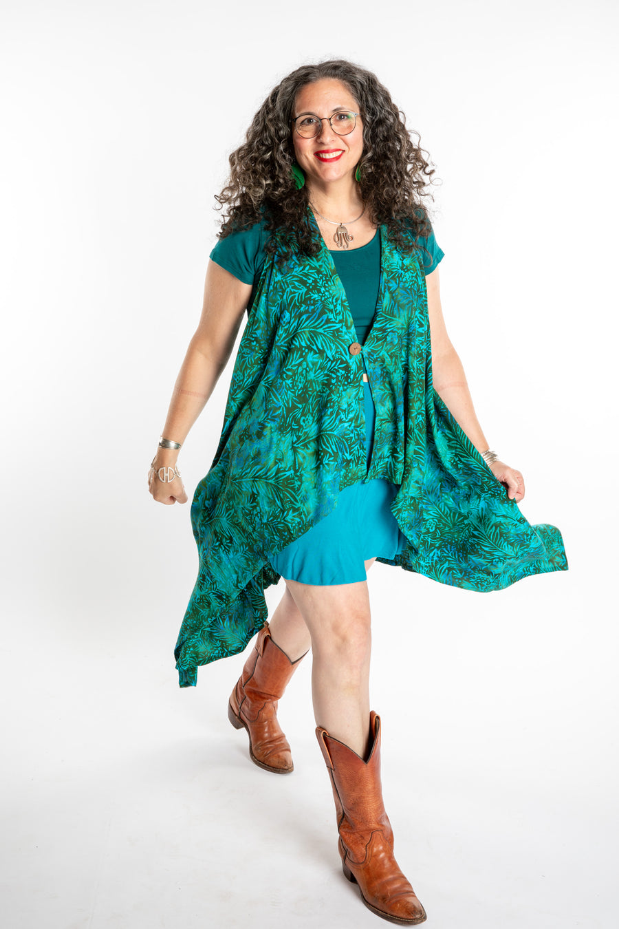 Susan wearing a long batik patterned vest in Jungle Green