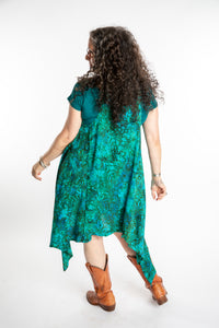 Susan wearing a long batik patterned vest in Jungle Green