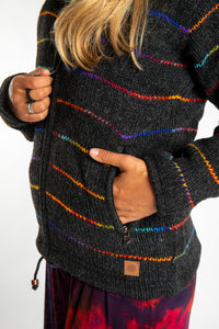 detail of the pocket on the rainbow striped wool hoodie jacket