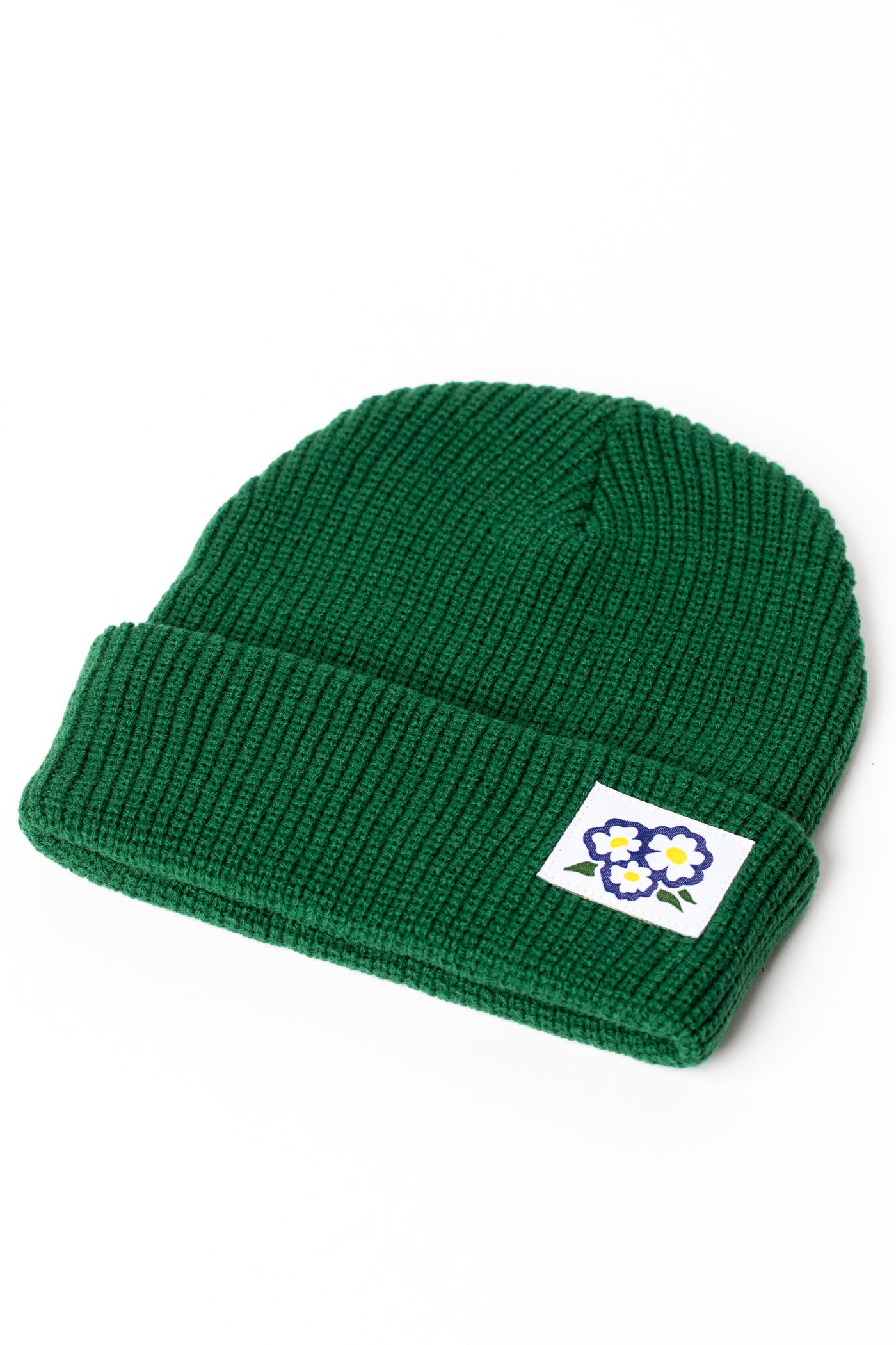 Forest Green knit acrylic beanie with a floral patch
