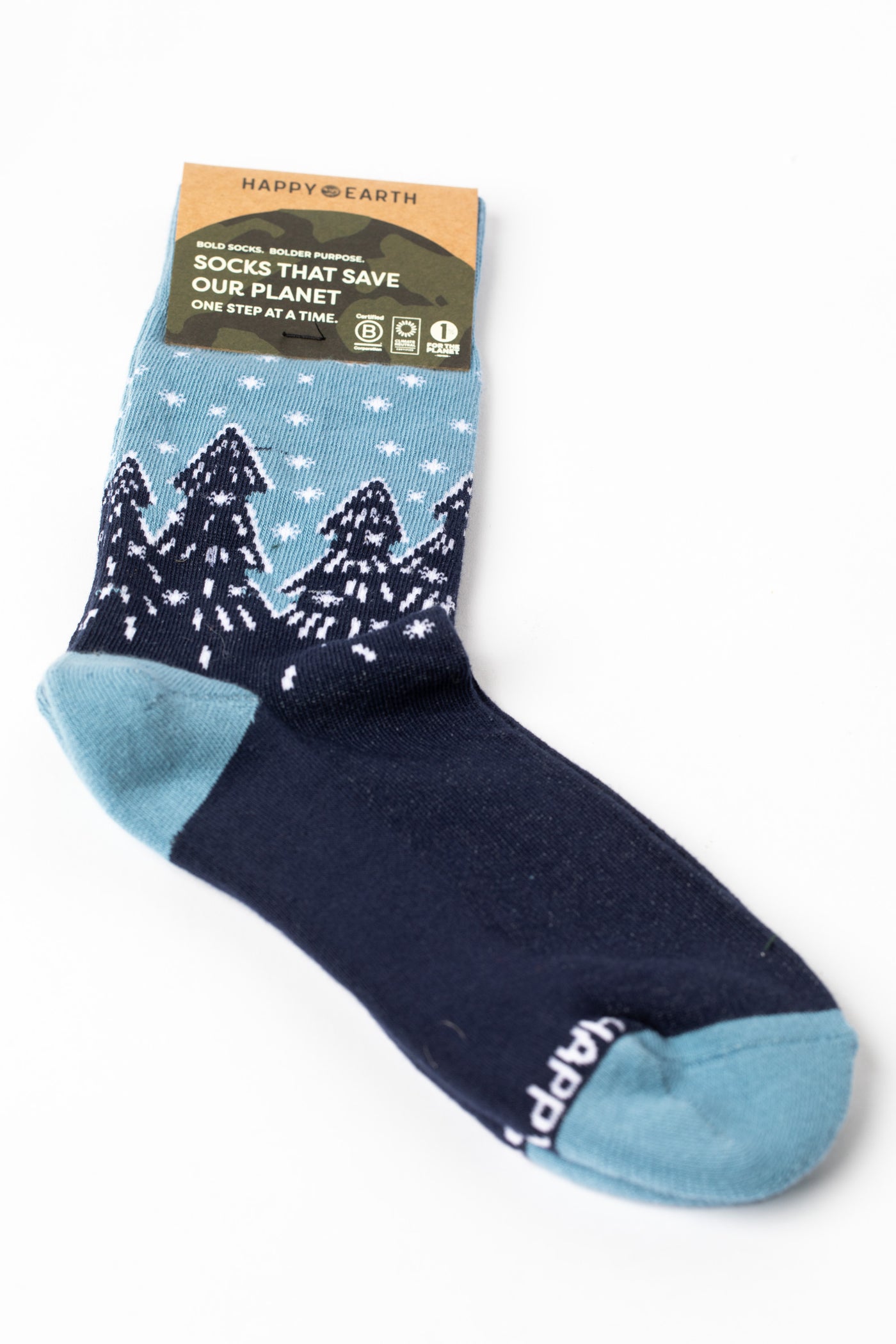Blue pair of socks with winter wonderland design