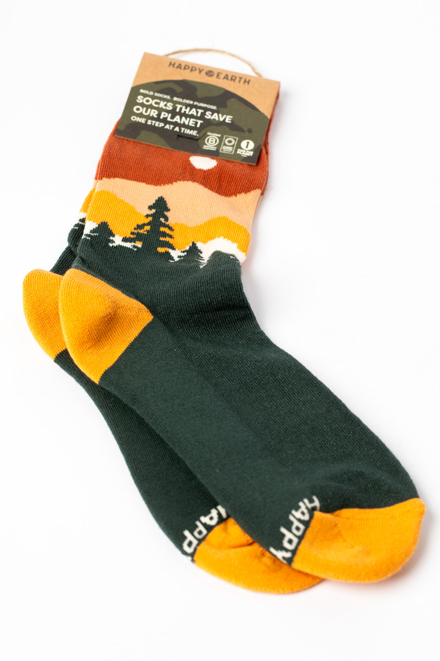 Multicolor green socks with orange accents and a nature-themed design.