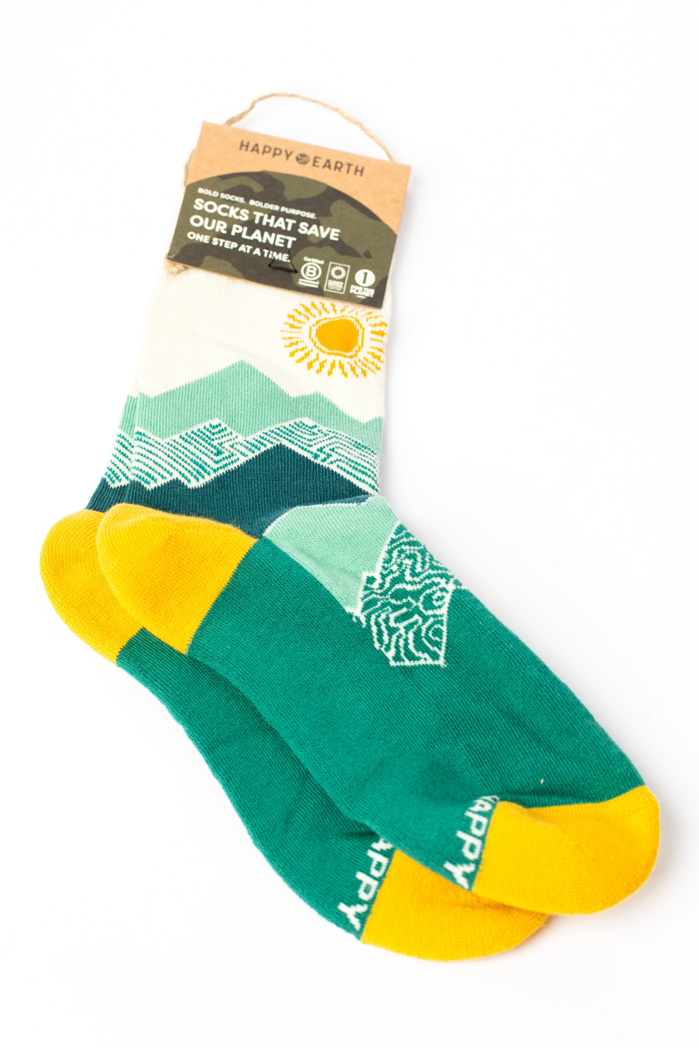 Green and yellow multicolor socks with mountain and sun design