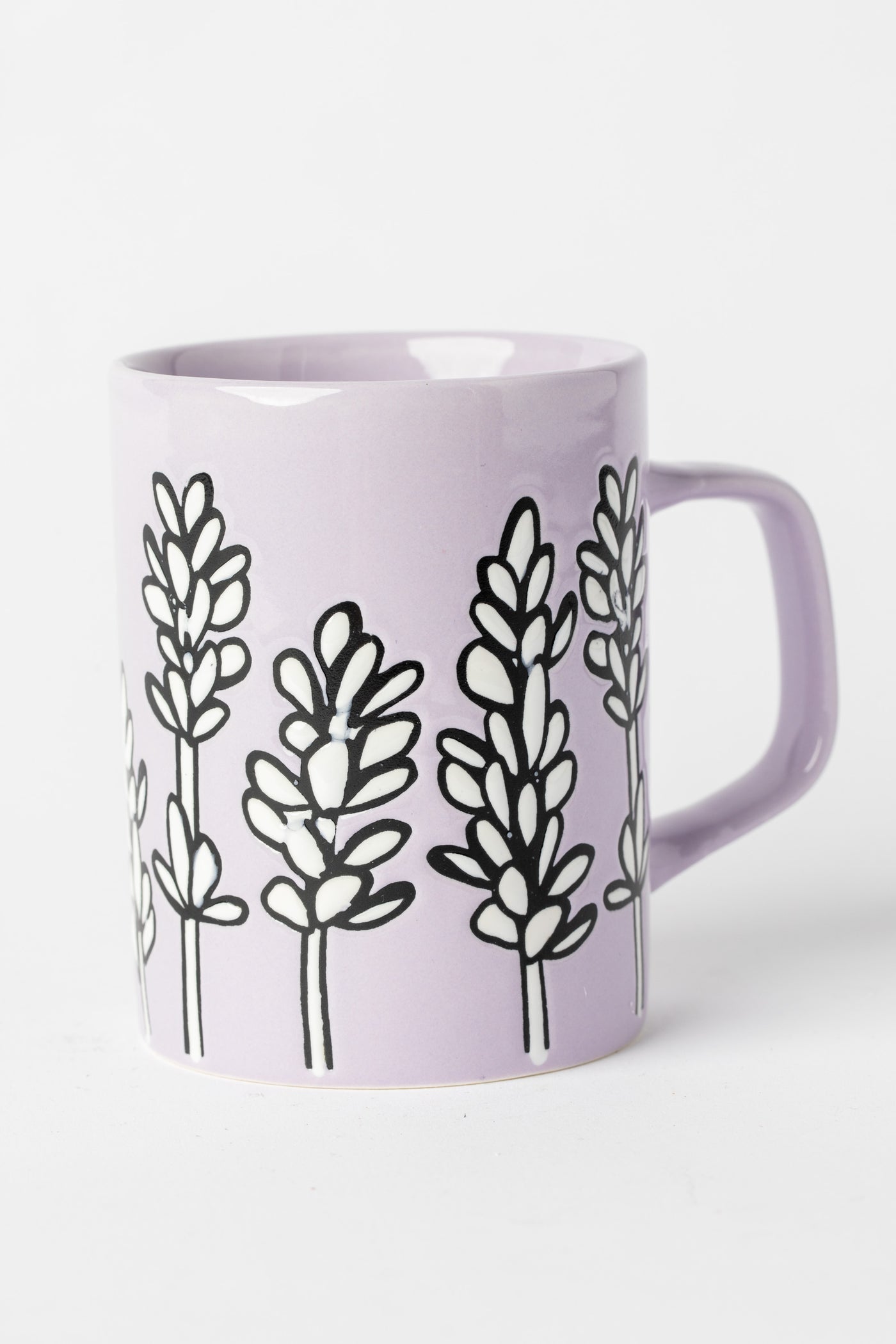 Lavender Mug with floral design and glossy glaze.
