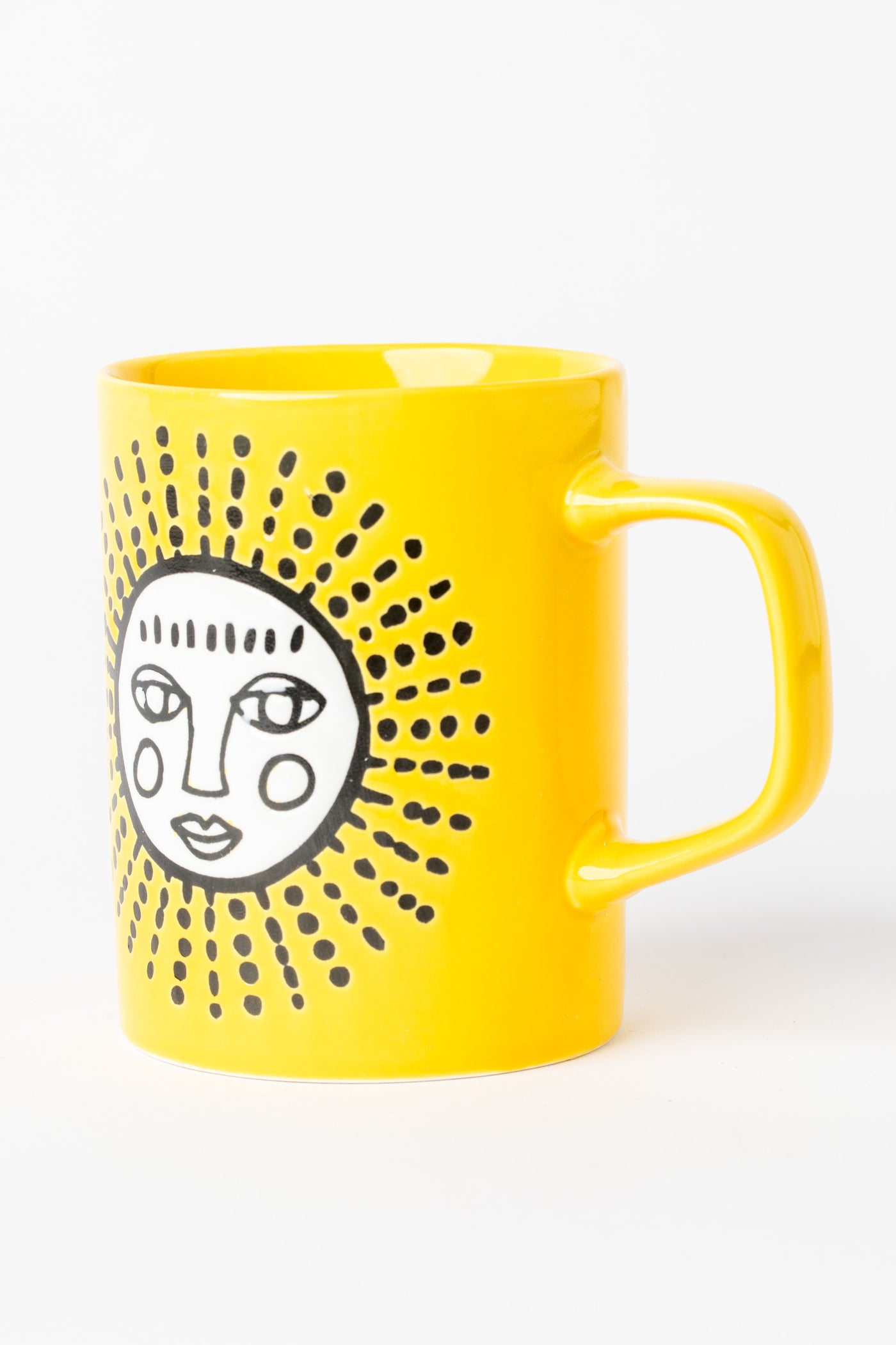 Yellow Sun Cuppa Color Mug with embossed face design.
