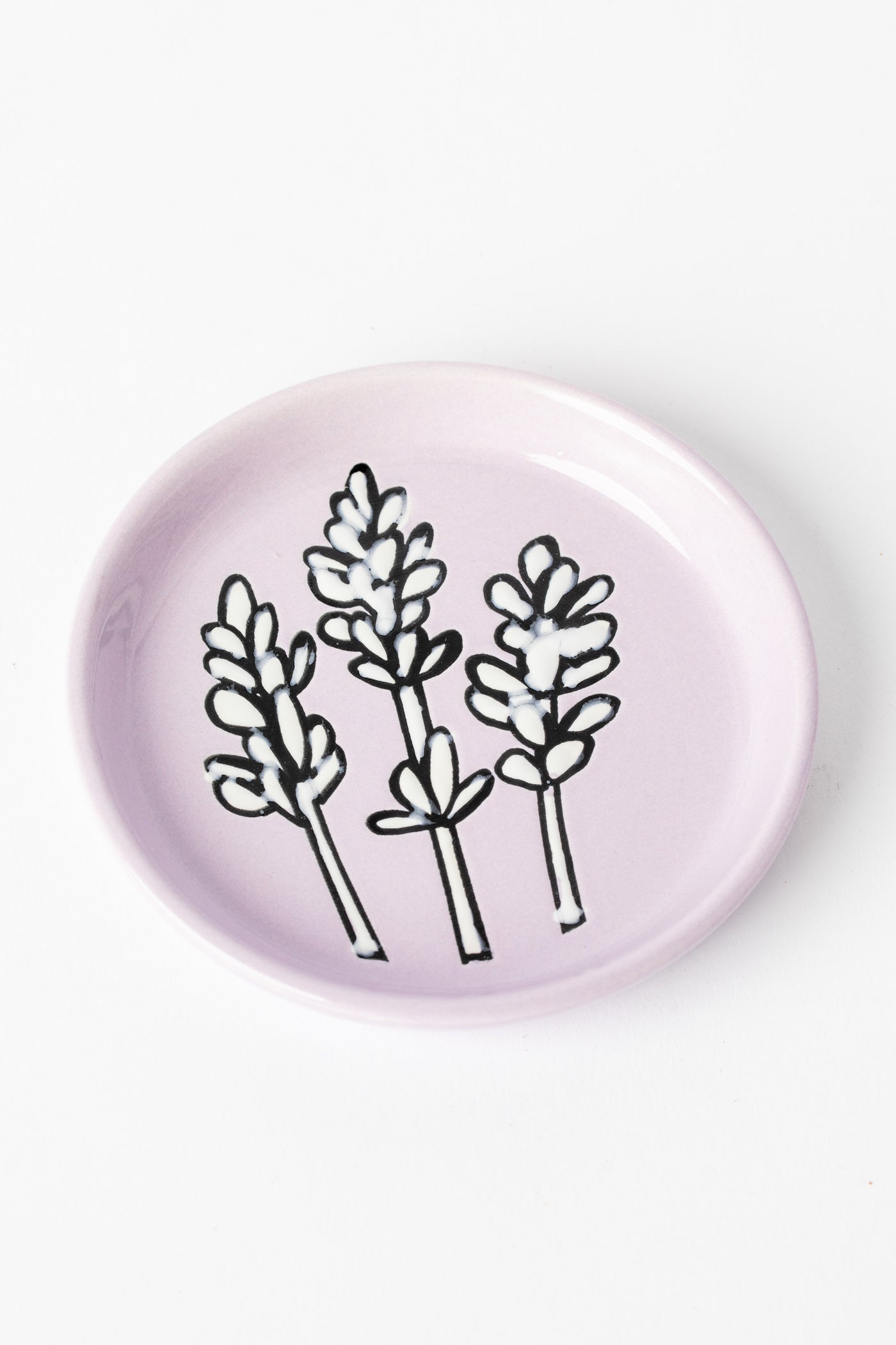Lavender ceramic coaster with floral design