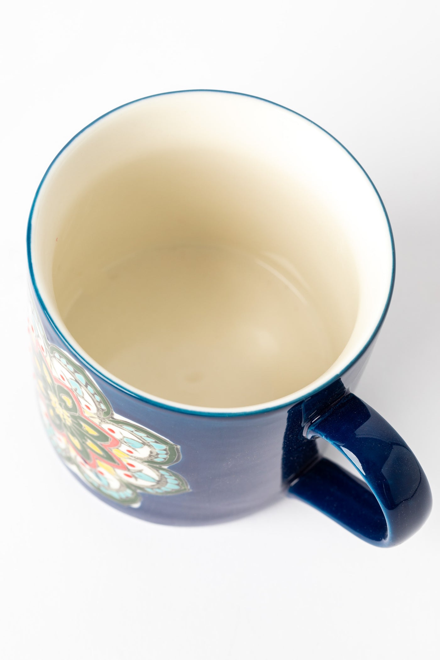Blue Mandala Mug showing interior cream glaze.