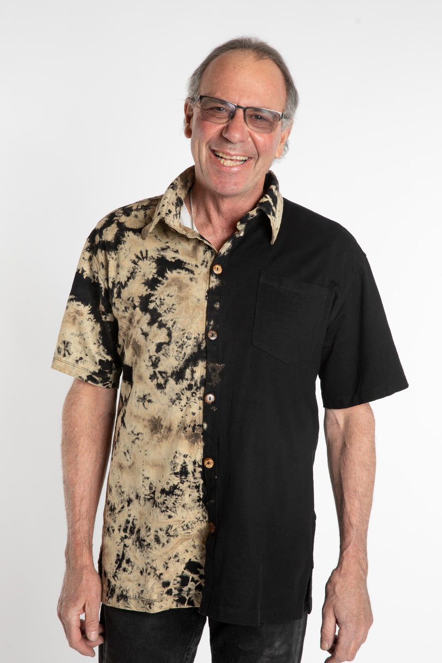 Ross is wearing the size S Sarin Tie Dye Button Up in Black and White