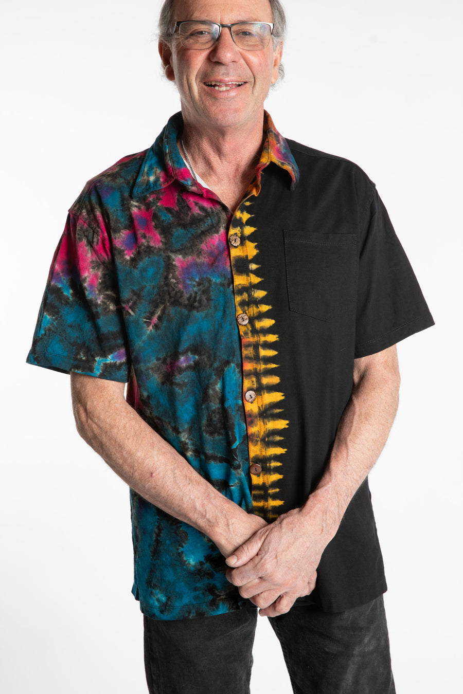 Ross is wearing the size S Sarin Tie Dye Button Up in Black Rainbow