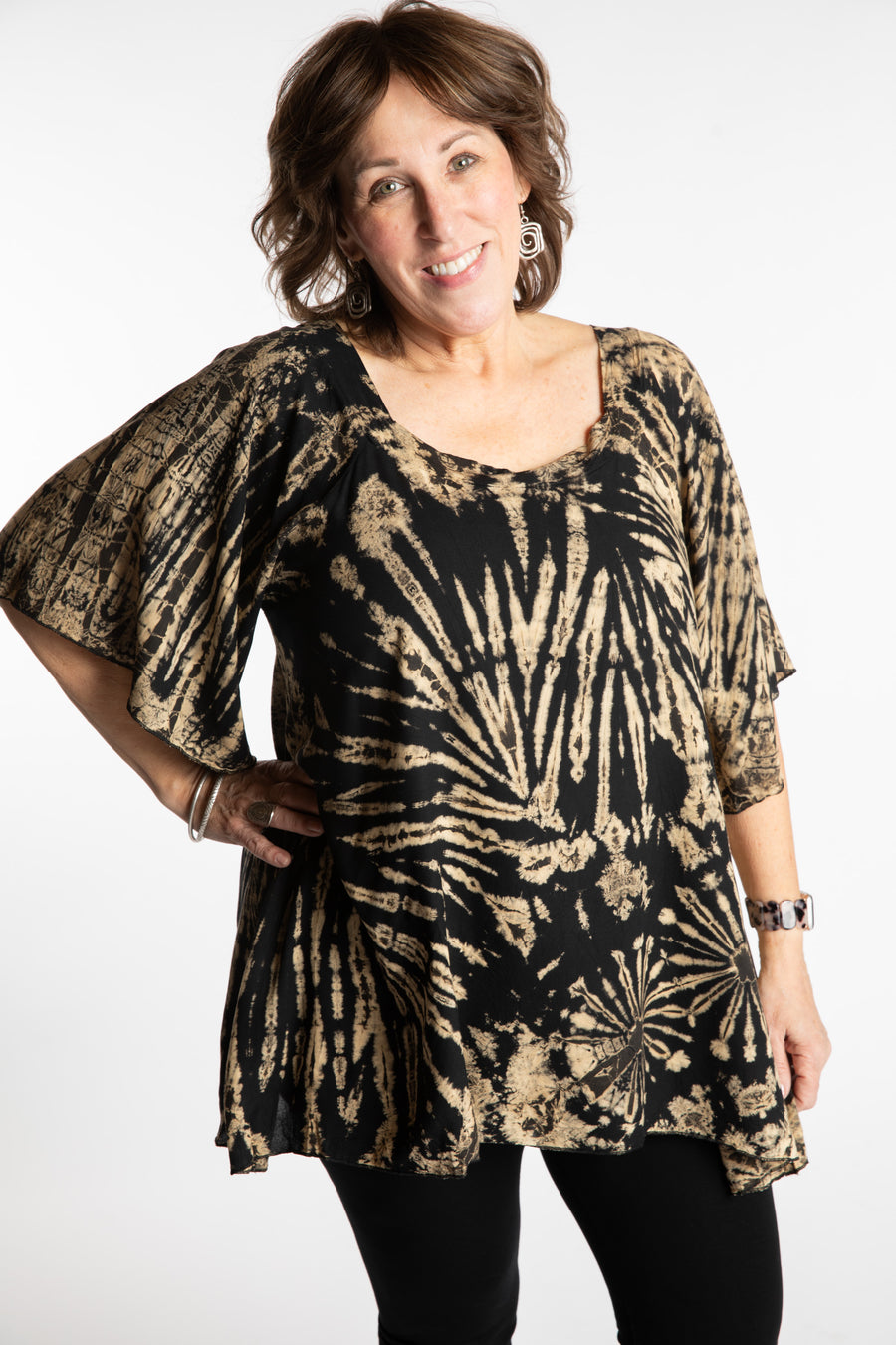 Betty is wearing the Black and White Benya Tie Dye Butterfly Top