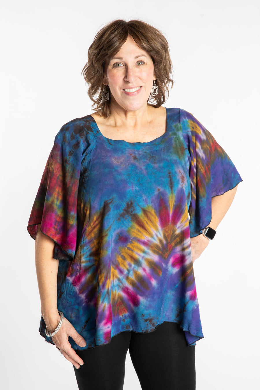 Betty is wearing the Purple Benya Tie Dye Butterfly Top