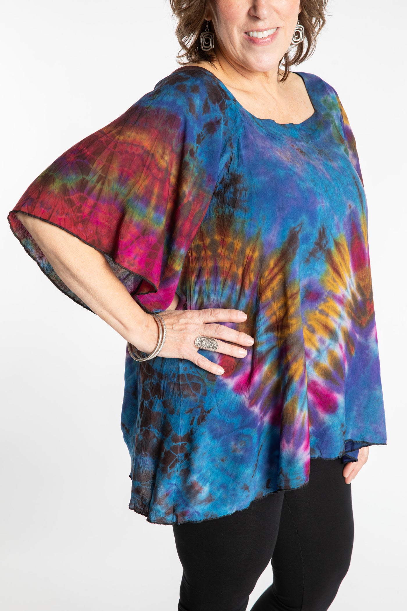Betty is wearing the Purple Benya Tie Dye Butterfly Top