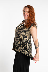 Maggie is wearing the Black and White Tie Dye Flutter Sleeve Top