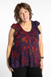 Betty is wearing the Purple Eggplant Tie Dye Flutter Sleeve Top
