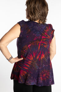 Betty is wearing the Purple Eggplant Tie Dye Flutter Sleeve Top