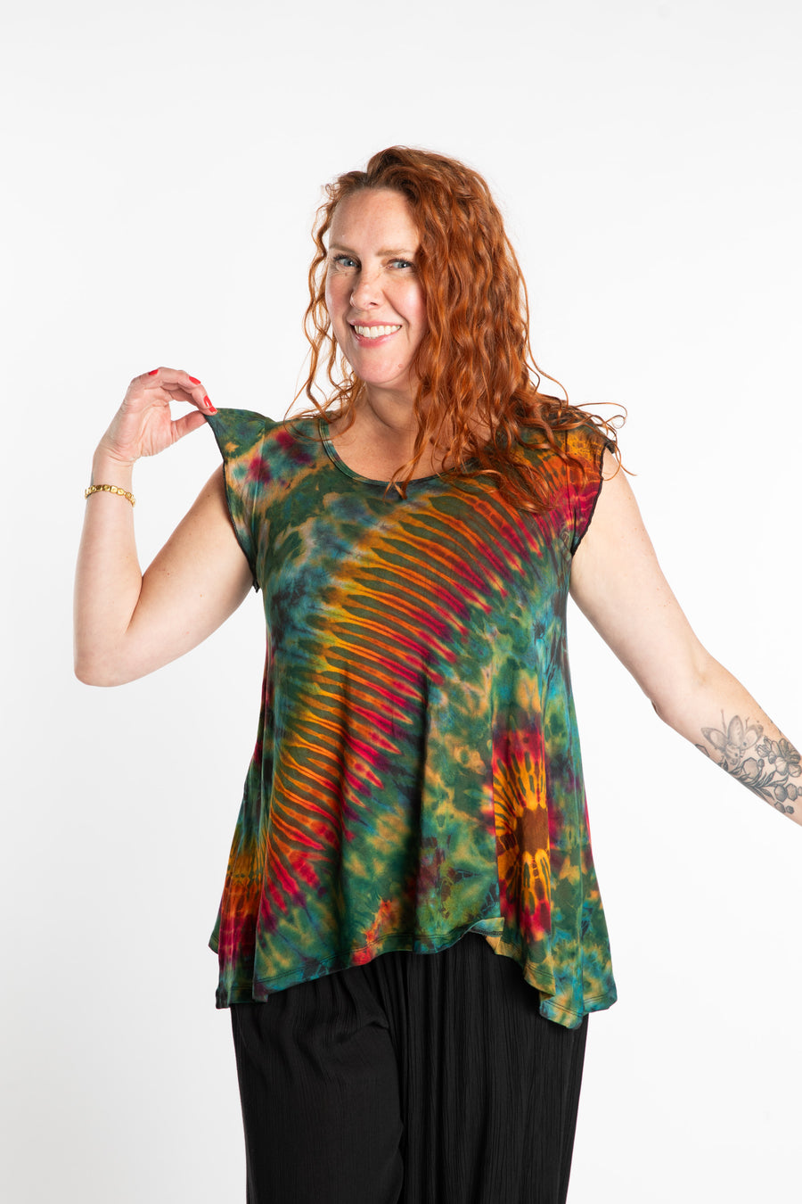 Maggie is wearing the Green Tie Dye Flutter Sleeve Top