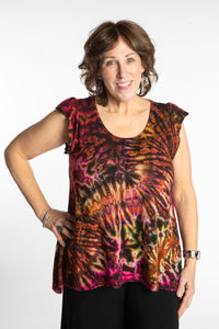 Betty is wearing the Orange Sunset Tie Dye Flutter Sleeve Top
