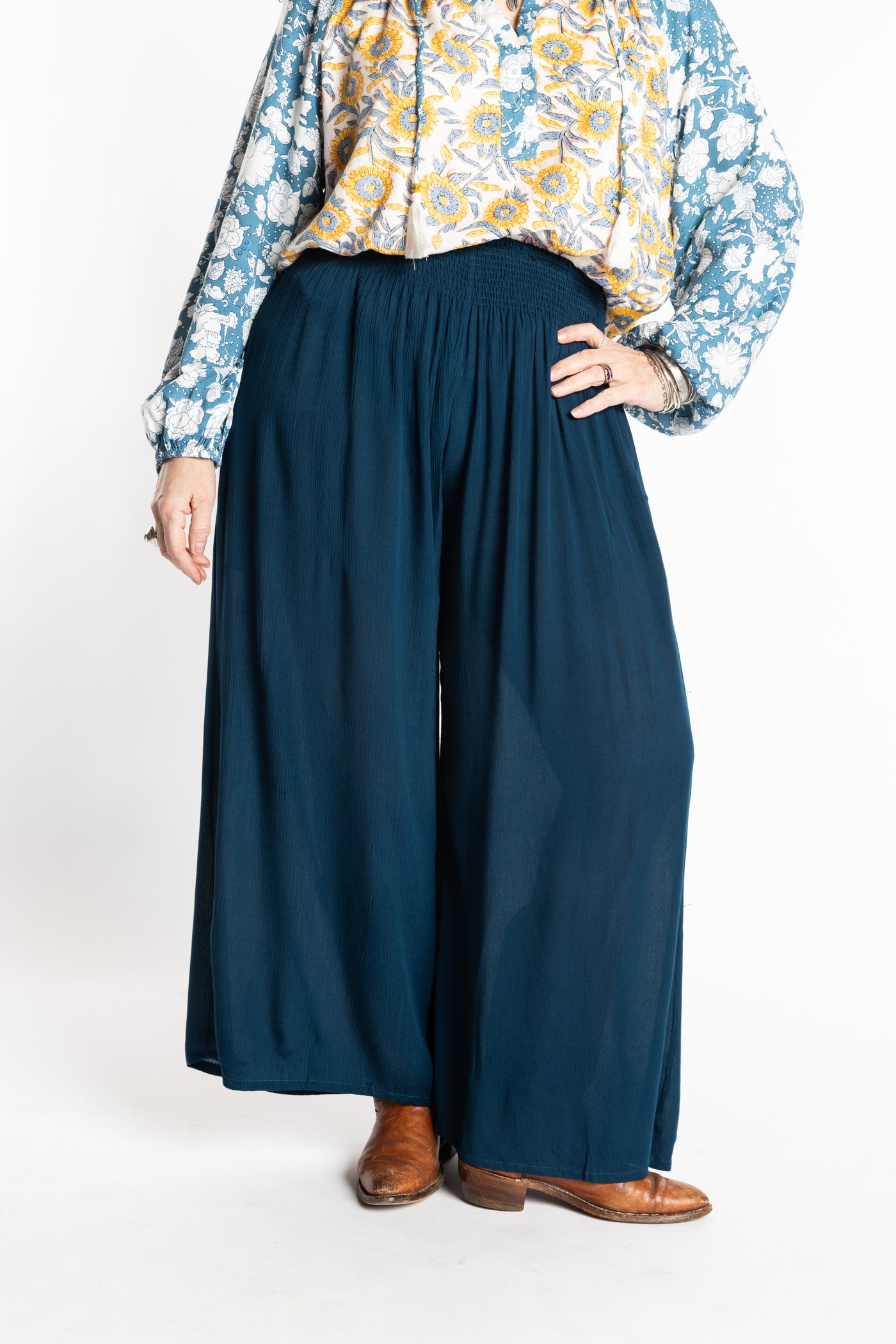 Susan is wearing the M/L blue Ocean Penny Lane bohemian wide leg Pants