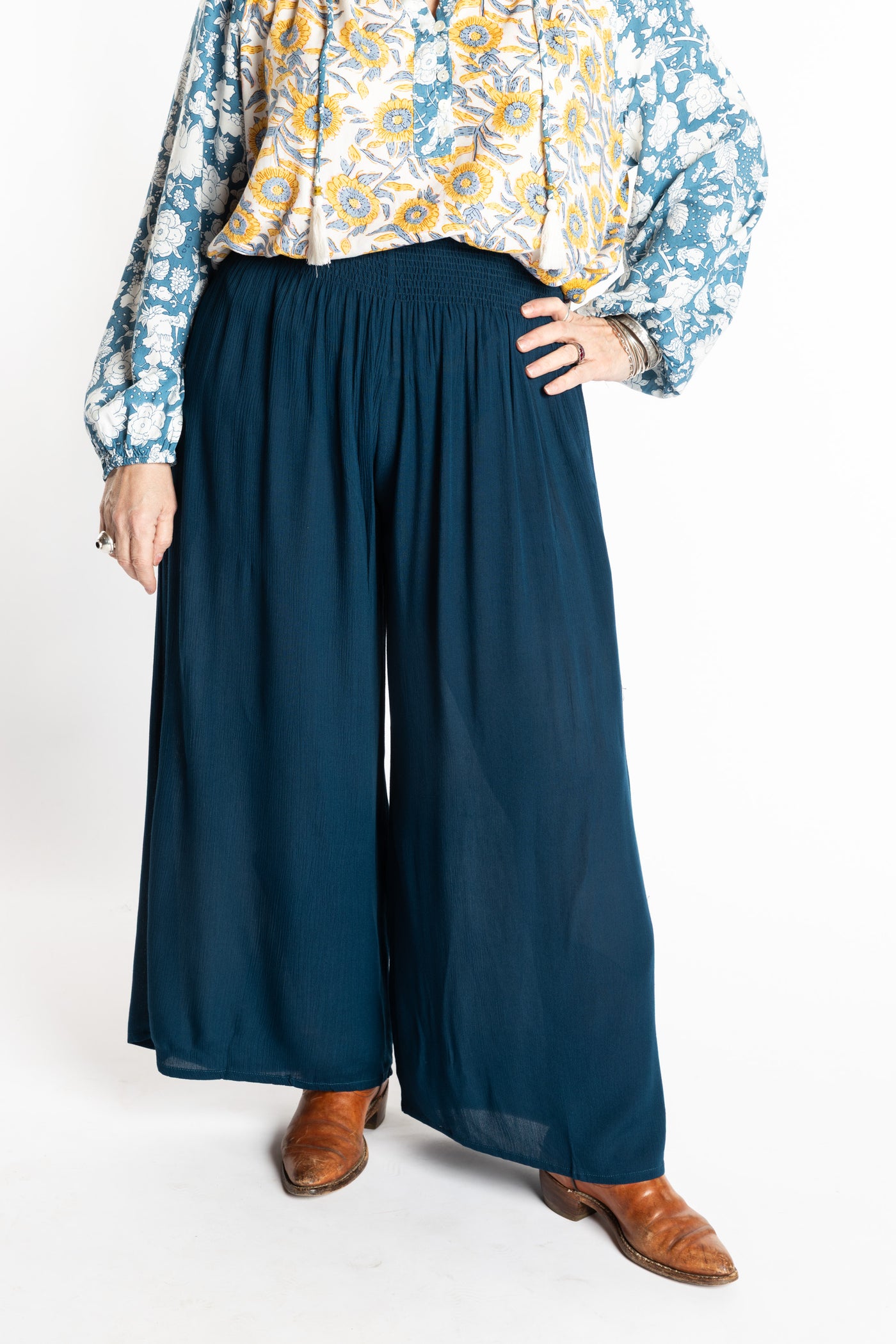 Susan is wearing the M/L blue Ocean Penny Lane bohemian wide leg Pants