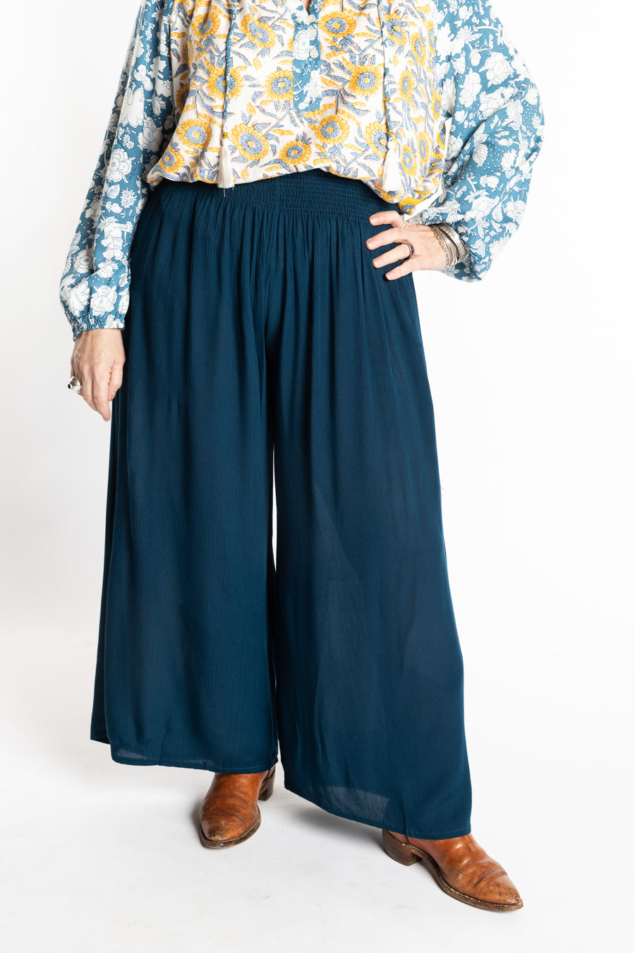 Susan is wearing the M/L blue Ocean Penny Lane bohemian wide leg Pants