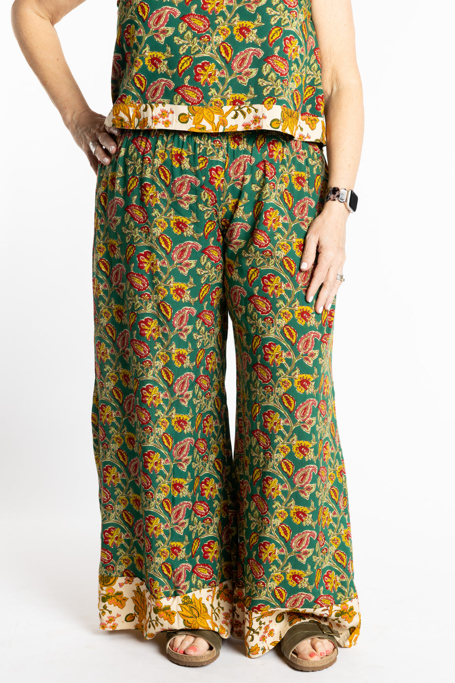 Betty wearing size M/L Forest Green floral Penny Lane contrast hem wide leg pants