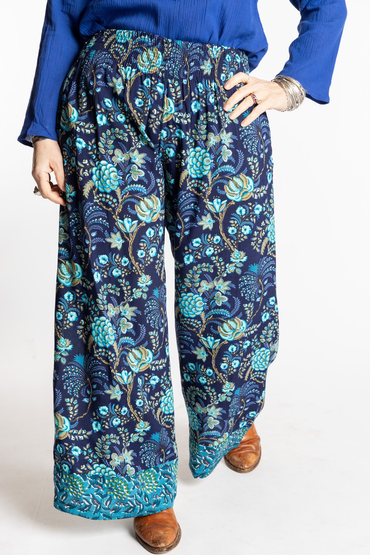 Susan wearing size M/L Navy blue floral Penny Lane contrast hem wide leg pants