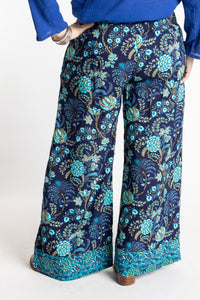 Susan wearing size M/L Navy blue floral Penny Lane contrast hem wide leg pants