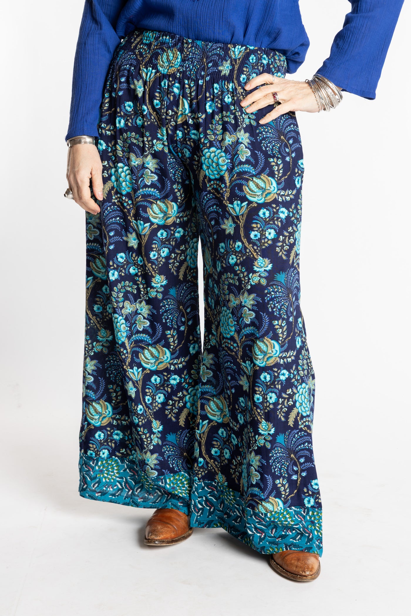 Susan wearing size M/L Navy blue floral Penny Lane contrast hem wide leg pants
