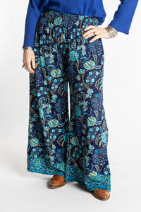 Susan wearing size M/L Navy blue floral Penny Lane contrast hem wide leg pants