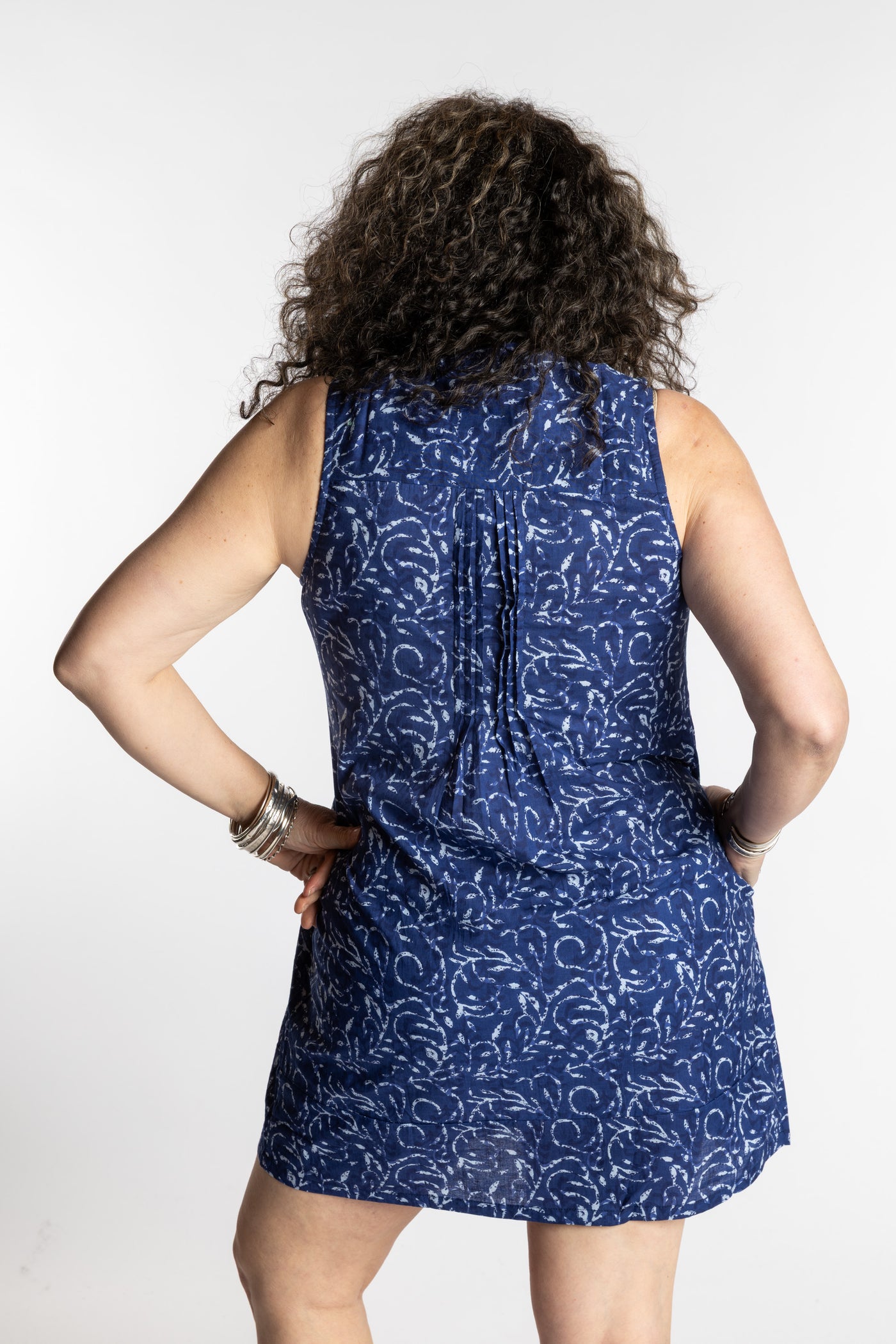 Susan is wearing the M/L Blue Night Tide Boho Cotton Mini Printed Dress