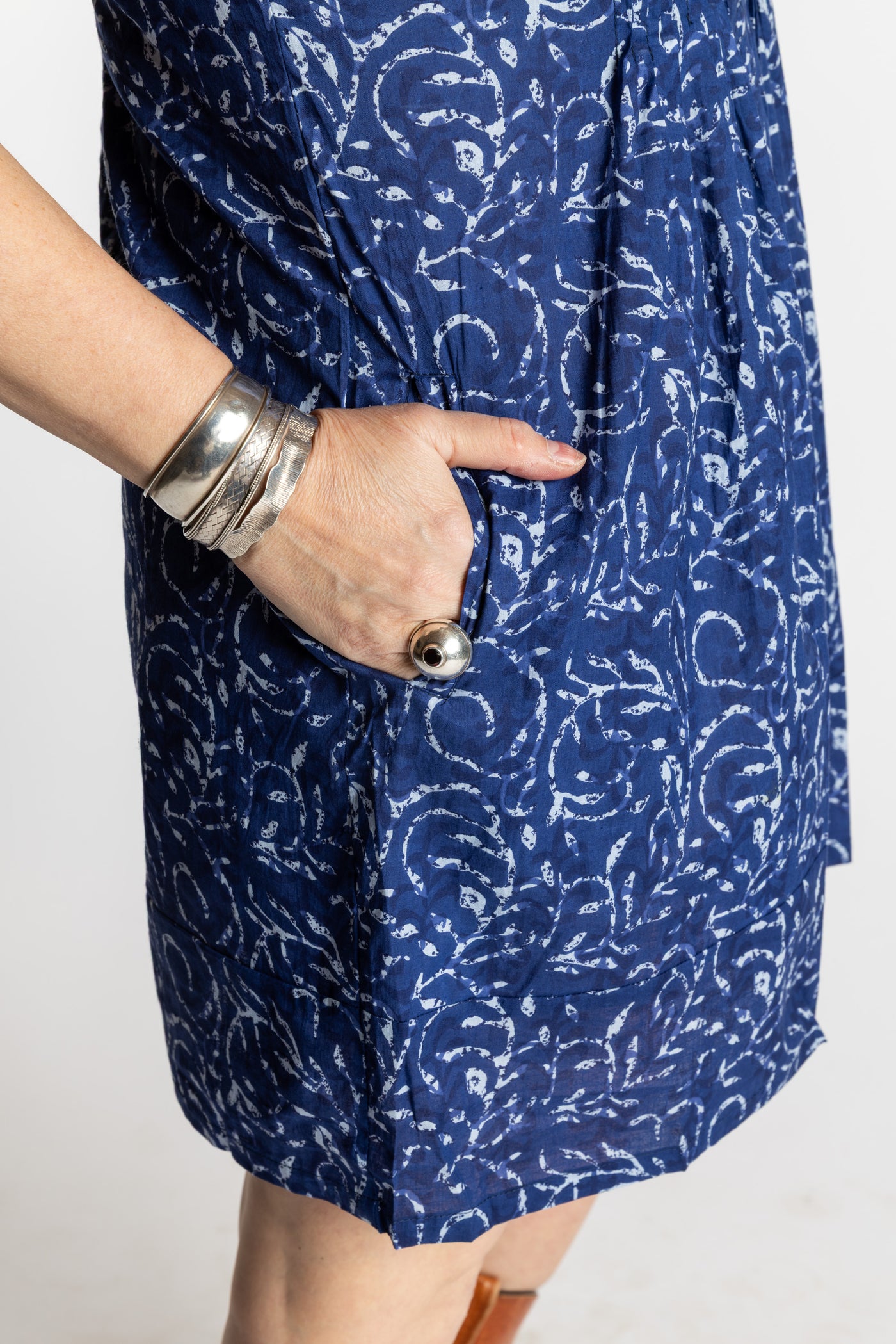 Susan is wearing the M/L Blue Night Tide Boho Cotton Mini Printed Dress