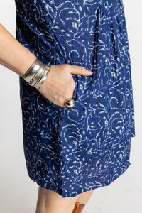 Susan is wearing the M/L Blue Night Tide Boho Cotton Mini Printed Dress