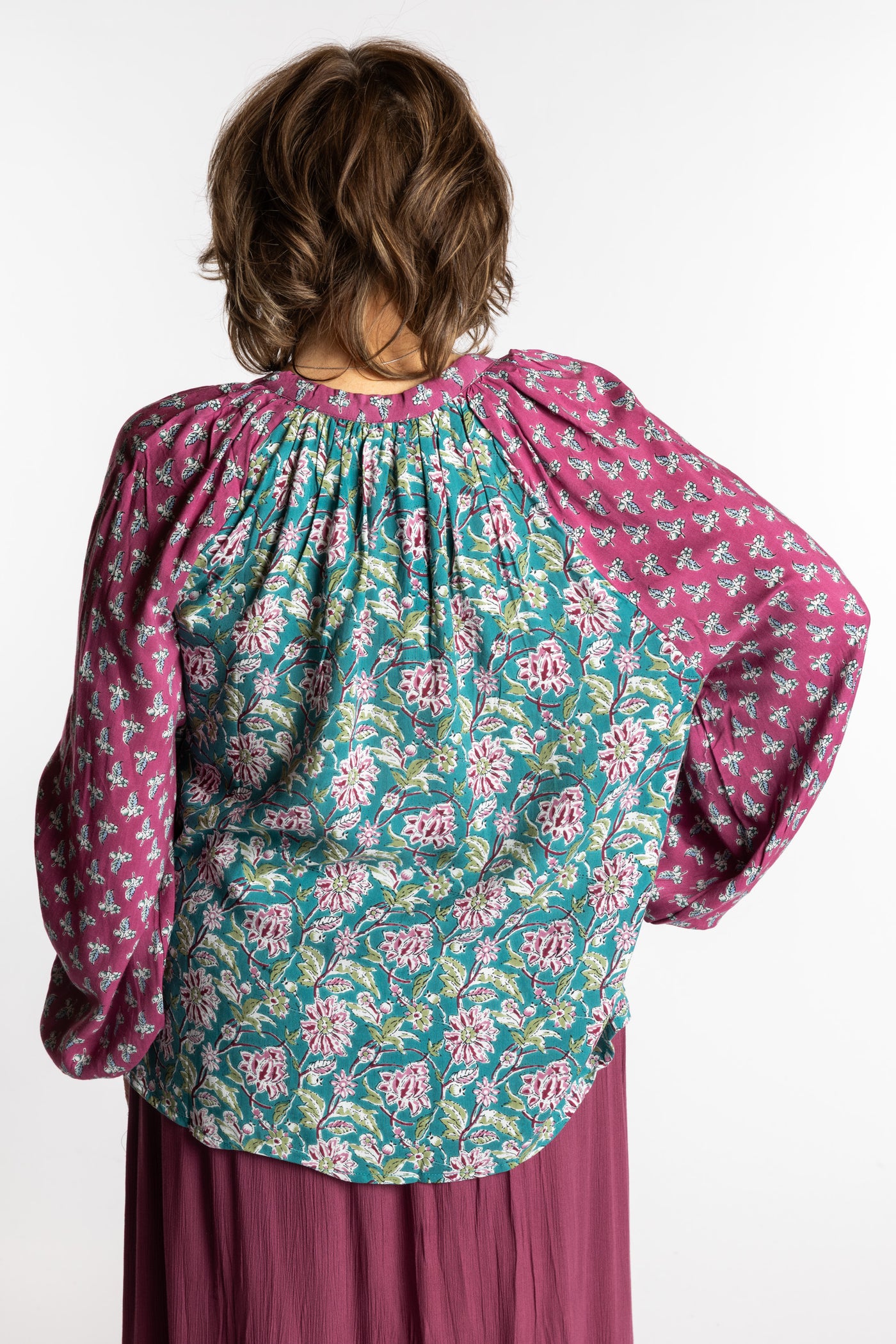 Betty is wearing the mixed print aquamarine boho floral poet blouse top
