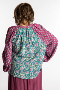 Betty is wearing the mixed print aquamarine boho floral poet blouse top
