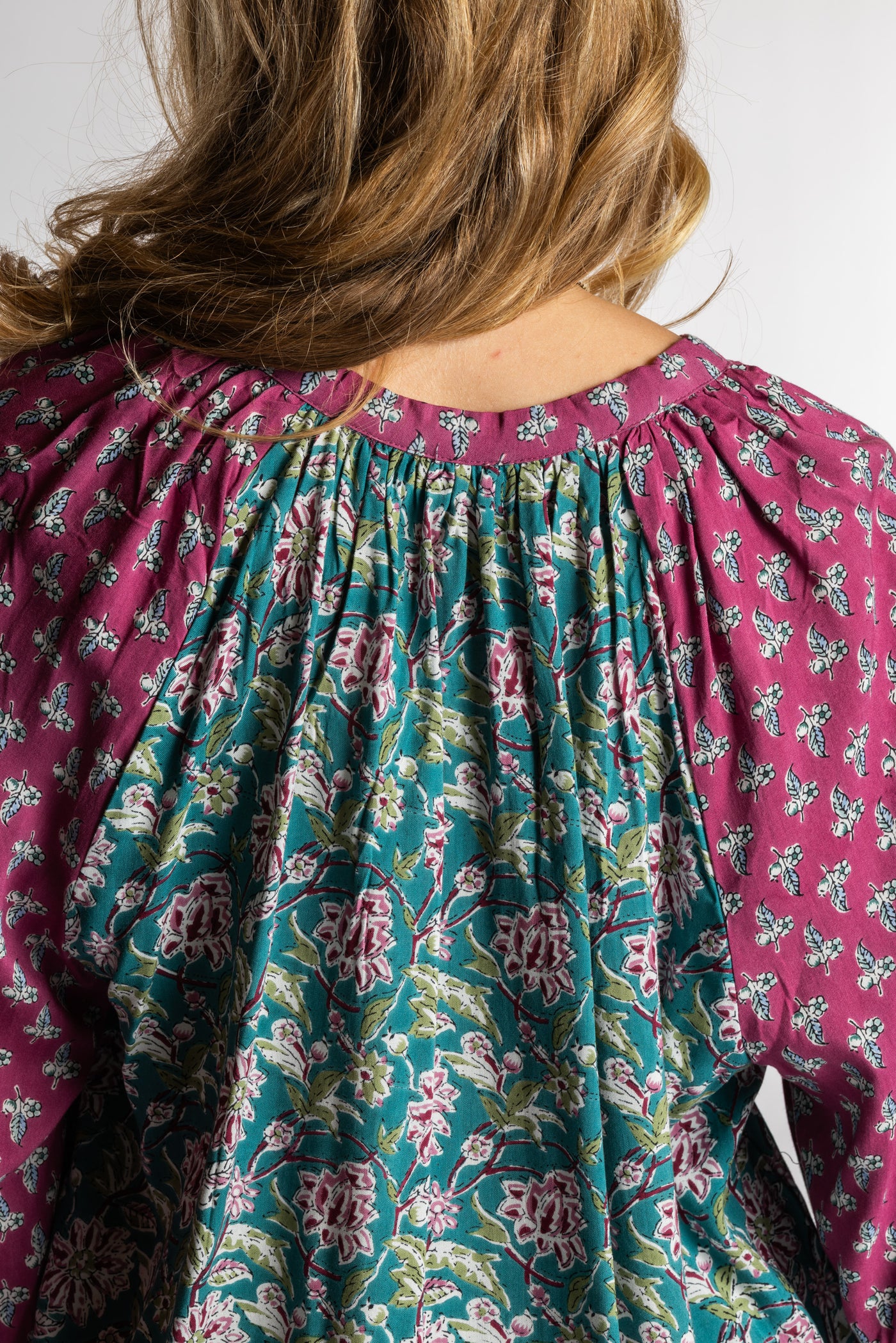 Sophie is wearing the mixed print aquamarine boho floral poet blouse top
