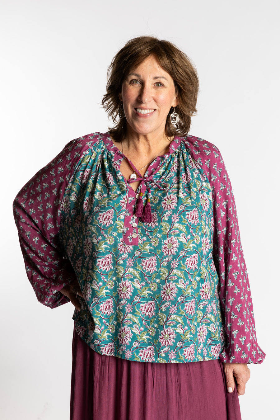 Betty is wearing the mixed print aquamarine boho floral poet blouse top
