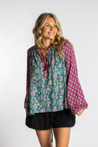 Sophie is wearing the mixed print aquamarine boho floral poet blouse top
