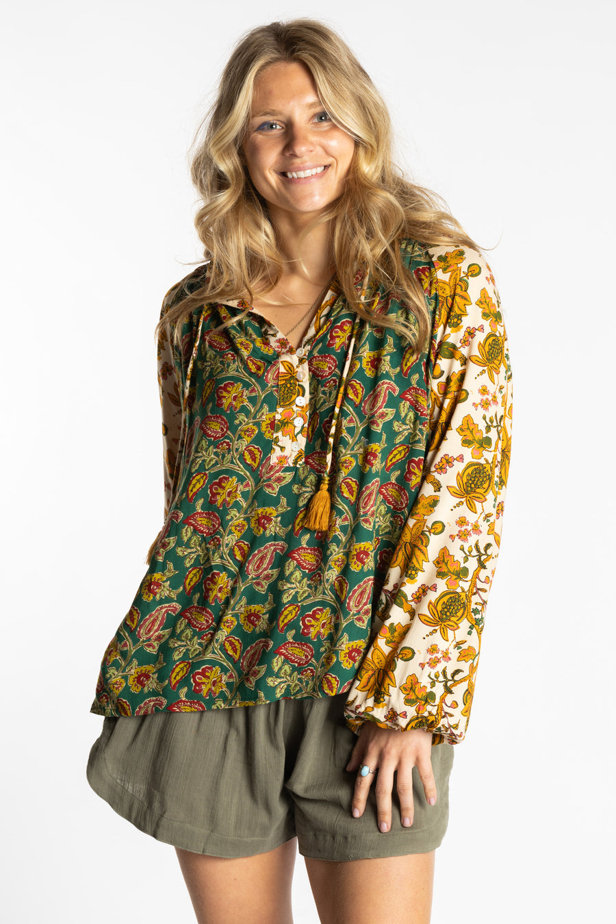 Sophie is wearing the mixed print forest green boho floral poet blouse top
