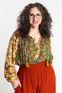 Susan is wearing the mixed print forest green boho floral poet blouse top
