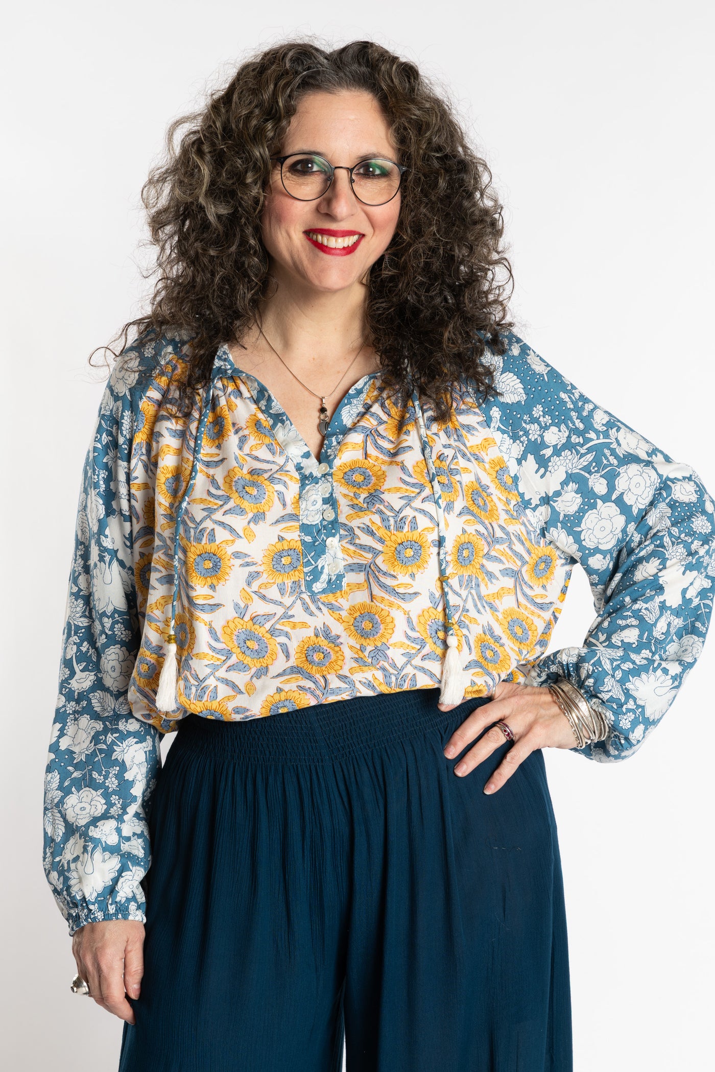 Susan is wearing the mixed print Sunflower boho floral poet blouse top
