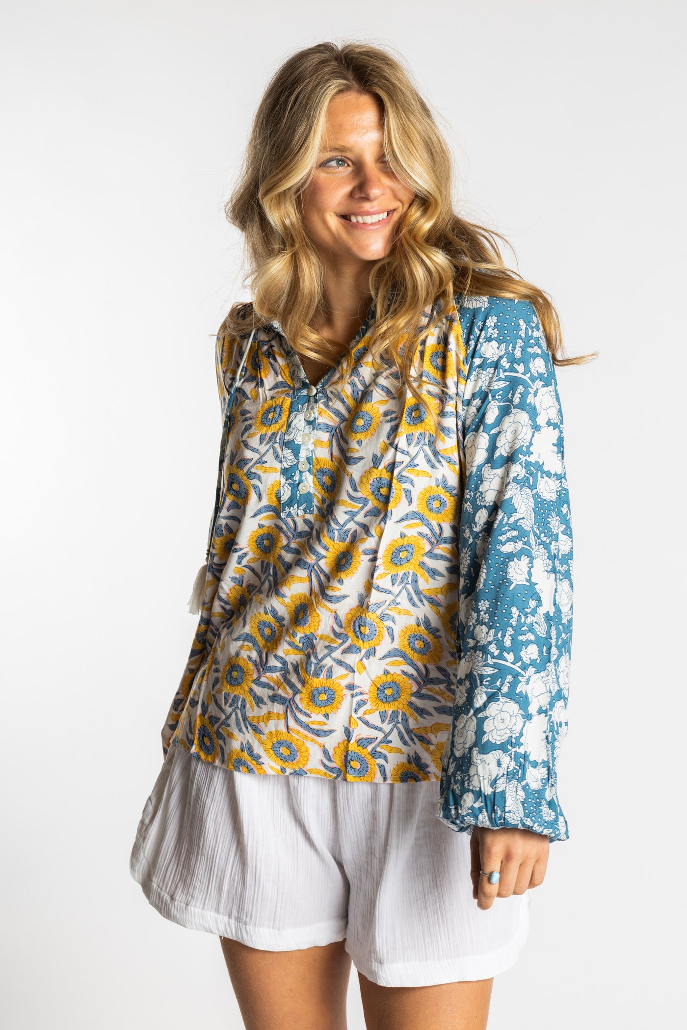 Sophie is wearing the mixed print sunflower boho floral poet blouse top

