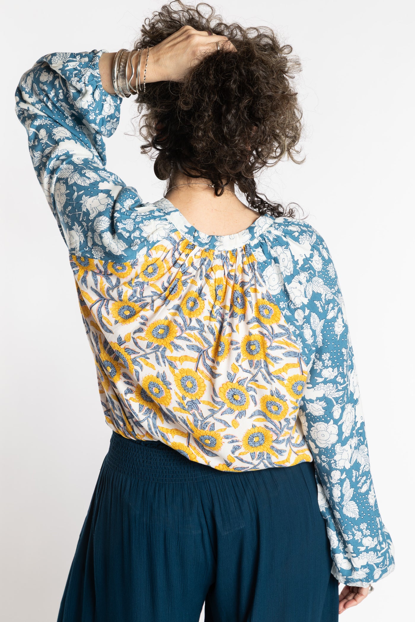Susan is wearing the mixed print Sunflower boho floral poet blouse top
