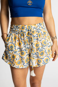 Sophie wearing the S/M ssunflower Summer Solstice Shorts with flowy relaxed silhouette